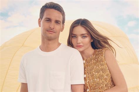 Miranda Kerr and Evan Spiegel give a Snap